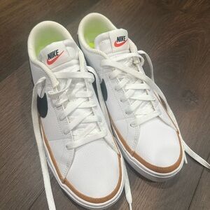 Nike women’s White and Tan Sneakers
